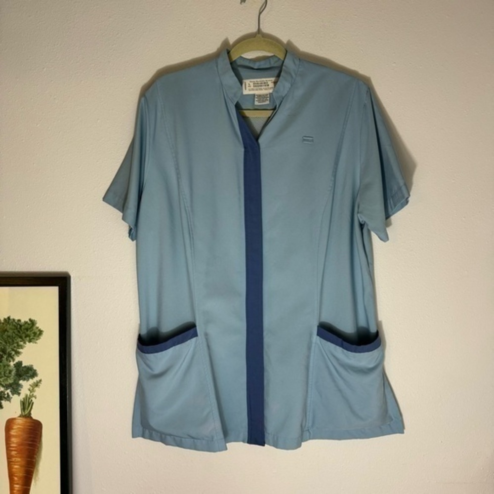 Disney Cast Member baby blue top size L